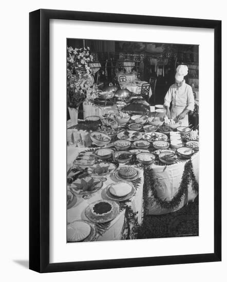 Chef Preparing Dish at Buffet Table in Dining Room of the Waldorf Astoria Hotel-Alfred Eisenstaedt-Framed Photographic Print