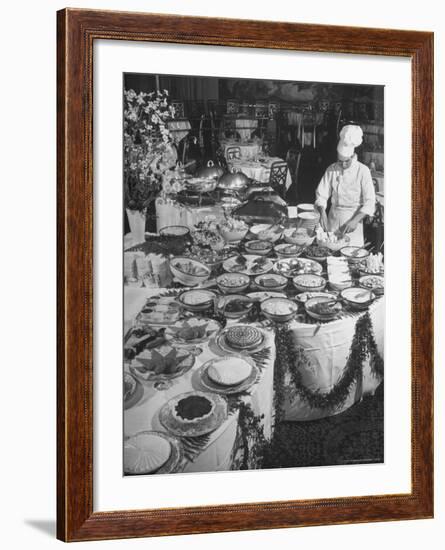 Chef Preparing Dish at Buffet Table in Dining Room of the Waldorf Astoria Hotel-Alfred Eisenstaedt-Framed Photographic Print