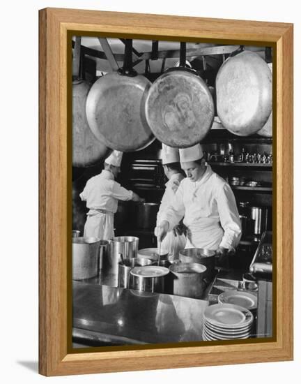 Chefs Cooking in a Restaurant Kitchen at Radio City-Bernard Hoffman-Framed Premier Image Canvas