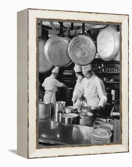 Chefs Cooking in a Restaurant Kitchen at Radio City-Bernard Hoffman-Framed Premier Image Canvas