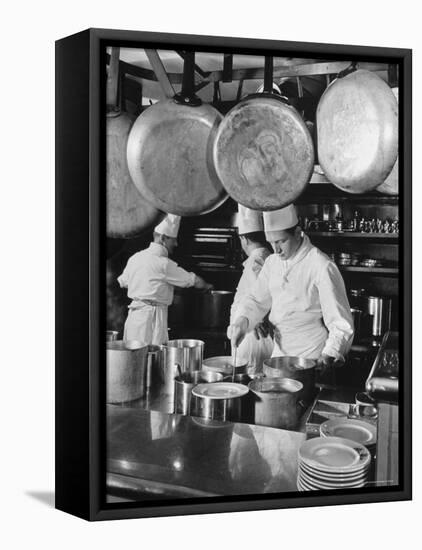 Chefs Cooking in a Restaurant Kitchen at Radio City-Bernard Hoffman-Framed Premier Image Canvas