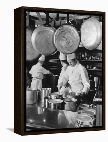 Chefs Cooking in a Restaurant Kitchen at Radio City-Bernard Hoffman-Framed Premier Image Canvas