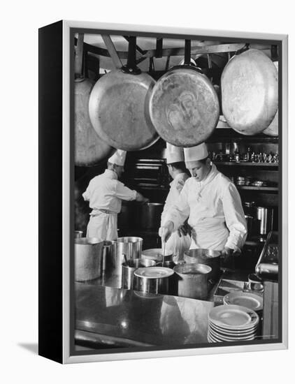 Chefs Cooking in a Restaurant Kitchen at Radio City-Bernard Hoffman-Framed Premier Image Canvas