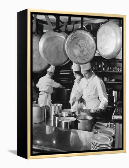 Chefs Cooking in a Restaurant Kitchen at Radio City-Bernard Hoffman-Framed Premier Image Canvas