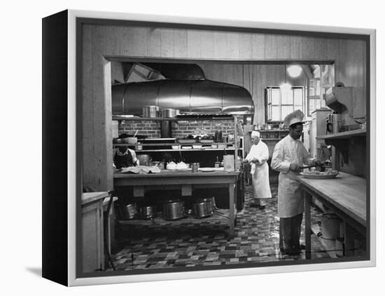 Chefs Working in the Kitchen at Gables-Peter Stackpole-Framed Premier Image Canvas