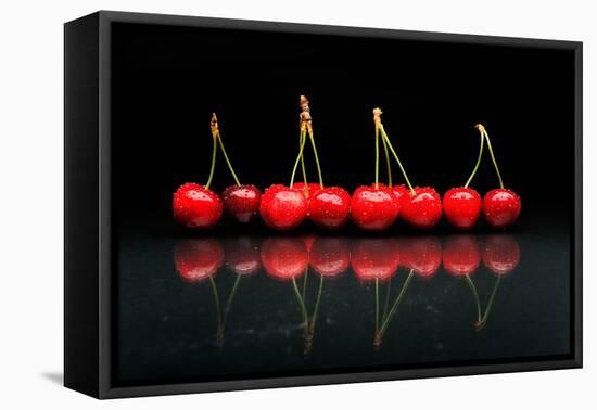 Cherries Against Black Background-mirceab-Framed Premier Image Canvas