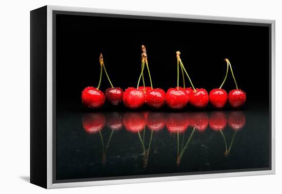 Cherries Against Black Background-mirceab-Framed Premier Image Canvas