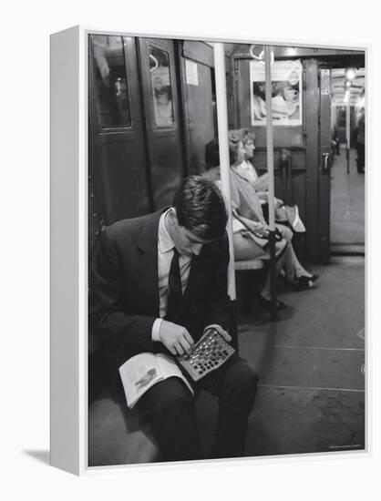 Chess Champion Bobby Fischer Working on His Moves During a Subway Ride-Carl Mydans-Framed Premier Image Canvas