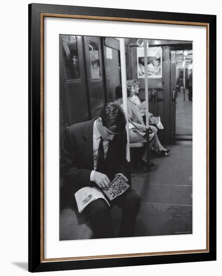 Chess Champion Bobby Fischer Working on His Moves During a Subway Ride-Carl Mydans-Framed Premium Photographic Print