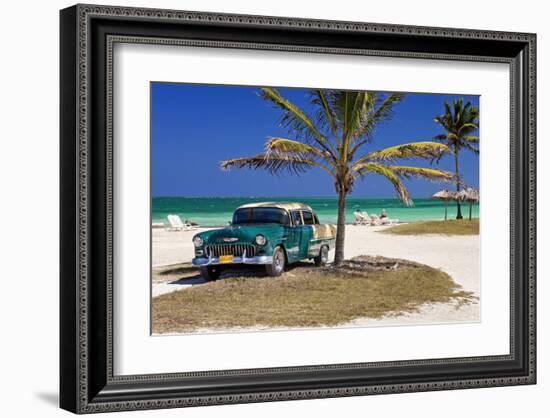 Chevrolet Classic Car under a Palm Tree on the Beach of the Island of Cayo Coco, Cuba-null-Framed Premium Giclee Print