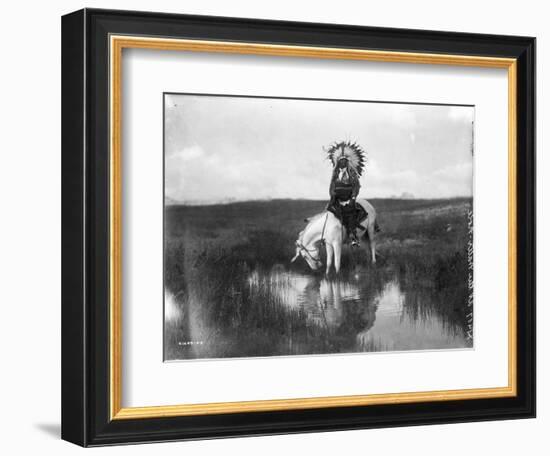Cheyenne Indian, Wearing Headdress, on Horseback Photograph-Lantern Press-Framed Premium Giclee Print