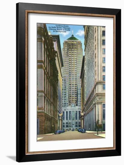 Chicago, Illinois, Exterior View of the Board of Trade Building, Looking Down La Salle Street-Lantern Press-Framed Art Print