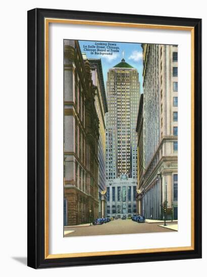 Chicago, Illinois, Exterior View of the Board of Trade Building, Looking Down La Salle Street-Lantern Press-Framed Art Print