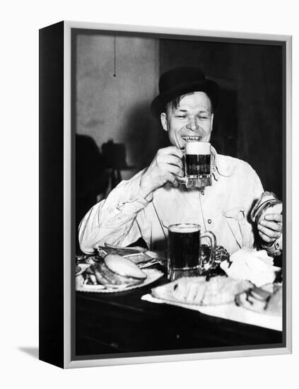 Chicago Worker Enjoys a Saloon Lunch That Provided Free Food to Go with the Purchased Beer, ca 1920-null-Framed Stretched Canvas