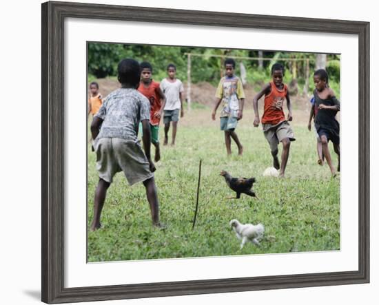 Chickens Run to Avoid a Soccer Game Played by Children from Lolovoli Village on the Island of Ambae-null-Framed Photographic Print