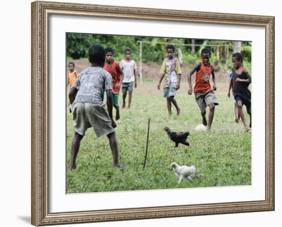 Chickens Run to Avoid a Soccer Game Played by Children from Lolovoli Village on the Island of Ambae-null-Framed Photographic Print