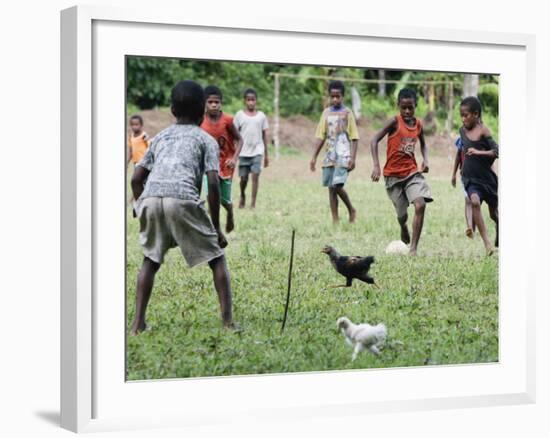 Chickens Run to Avoid a Soccer Game Played by Children from Lolovoli Village on the Island of Ambae-null-Framed Photographic Print