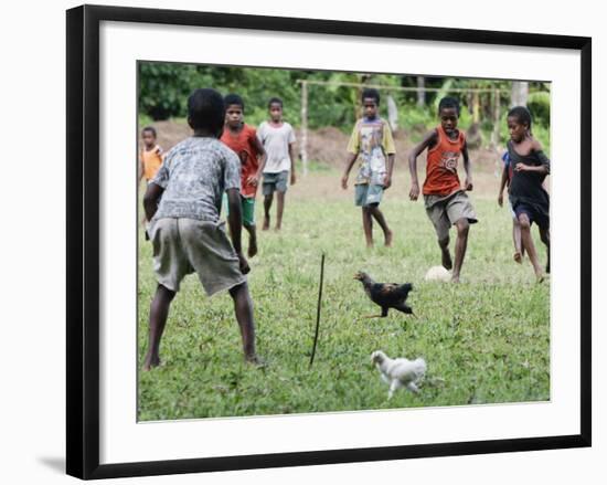 Chickens Run to Avoid a Soccer Game Played by Children from Lolovoli Village on the Island of Ambae-null-Framed Photographic Print