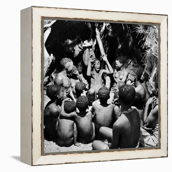 Chief Acts Out a Story to Bushman Children, Southern Kalahari Desert in Central Southern Africa-Nat Farbman-Framed Premier Image Canvas