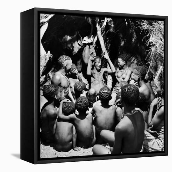 Chief Acts Out a Story to Bushman Children, Southern Kalahari Desert in Central Southern Africa-Nat Farbman-Framed Premier Image Canvas