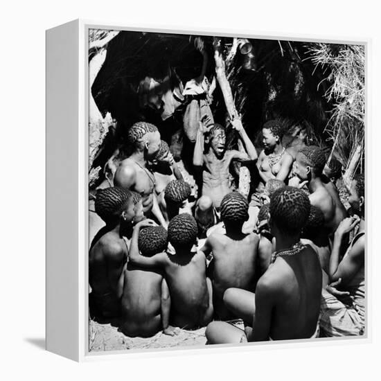 Chief Acts Out a Story to Bushman Children, Southern Kalahari Desert in Central Southern Africa-Nat Farbman-Framed Premier Image Canvas