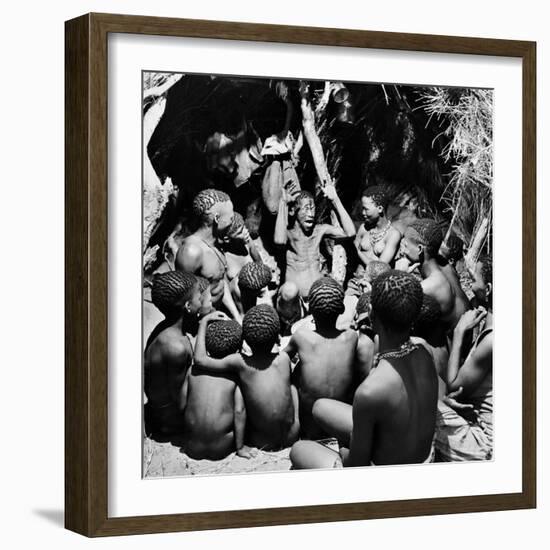 Chief Acts Out a Story to Bushman Children, Southern Kalahari Desert in Central Southern Africa-Nat Farbman-Framed Photographic Print