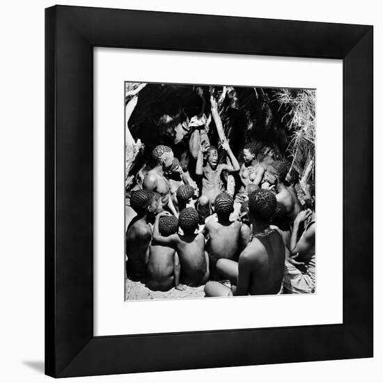 Chief Acts Out a Story to Bushman Children, Southern Kalahari Desert in Central Southern Africa-Nat Farbman-Framed Photographic Print