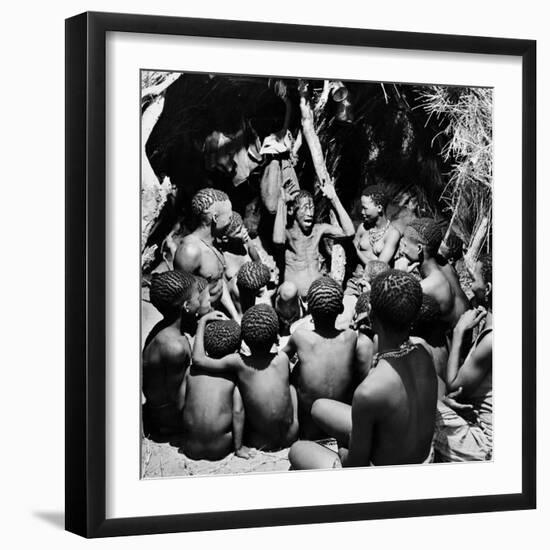 Chief Acts Out a Story to Bushman Children, Southern Kalahari Desert in Central Southern Africa-Nat Farbman-Framed Photographic Print