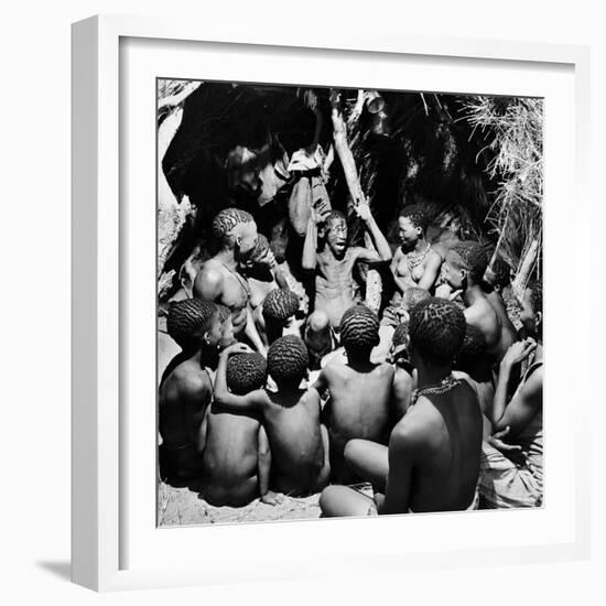 Chief Acts Out a Story to Bushman Children, Southern Kalahari Desert in Central Southern Africa-Nat Farbman-Framed Photographic Print