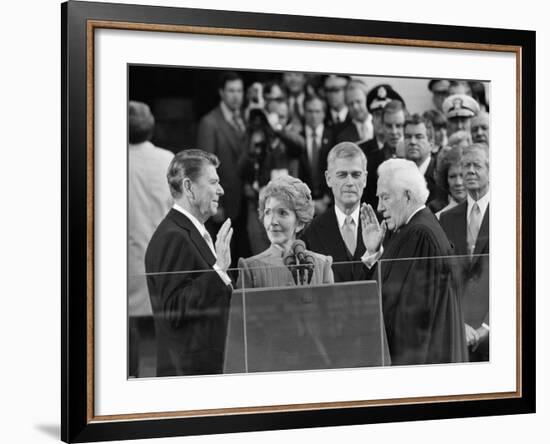 Chief Justice Warren Burger Administers the Oath of Office to Ronald Reagan, January 20, 1981-null-Framed Photographic Print