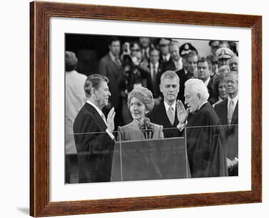 Chief Justice Warren Burger Administers the Oath of Office to Ronald Reagan, January 20, 1981-null-Framed Photographic Print