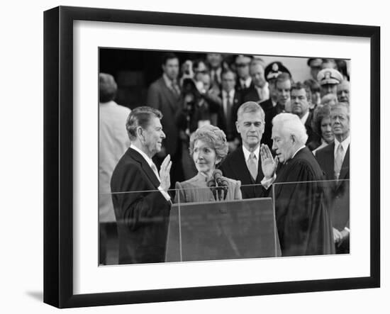 Chief Justice Warren Burger Administers the Oath of Office to Ronald Reagan, January 20, 1981-null-Framed Photographic Print