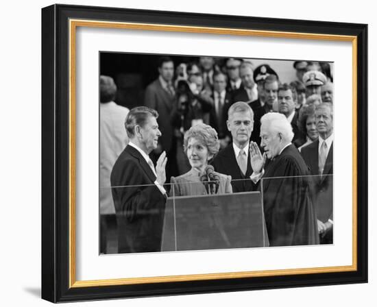 Chief Justice Warren Burger Administers the Oath of Office to Ronald Reagan, January 20, 1981-null-Framed Photographic Print