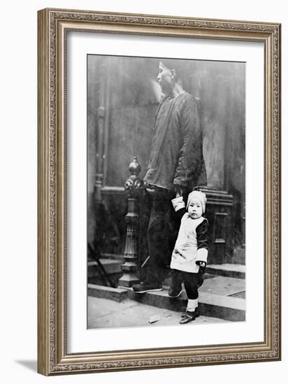 Child and Adult during New Year's in Chinatown NYC Photo - New York, NY-Lantern Press-Framed Art Print