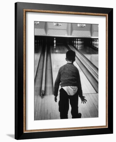 Child Bowling at a Local Bowling Alley-Art Rickerby-Framed Photographic Print