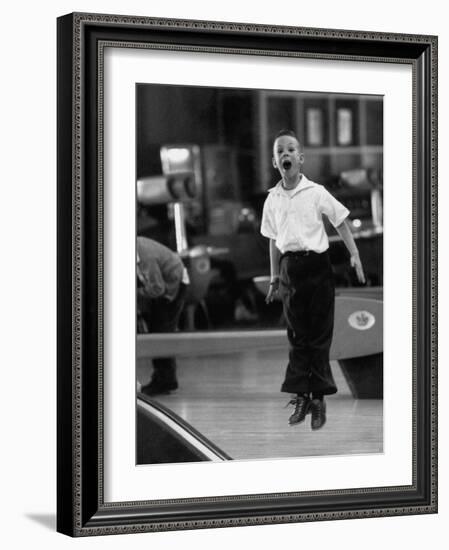 Child Bowling at a Local Bowling Alley-Art Rickerby-Framed Photographic Print