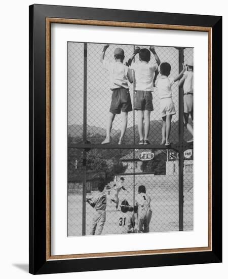 Child Fans of Baseball Watching on a Fence-Eliot Elisofon-Framed Photographic Print