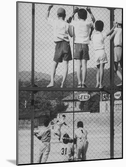 Child Fans of Baseball Watching on a Fence-Eliot Elisofon-Mounted Photographic Print