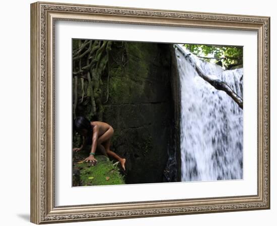 Child from the Ache Indigenous Group Plays Near a Waterfall in Cerro Moroti, Paraguay-null-Framed Photographic Print