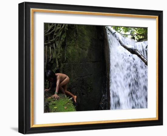 Child from the Ache Indigenous Group Plays Near a Waterfall in Cerro Moroti, Paraguay-null-Framed Photographic Print