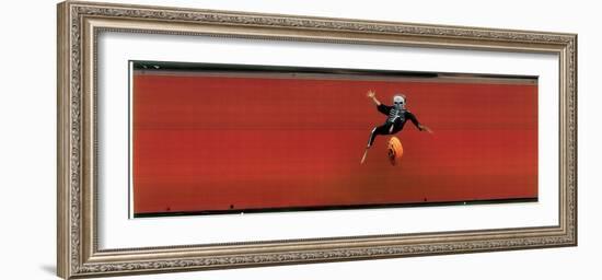 Child in Halloween Skeleton Costume Jumping in Air-George Silk-Framed Photographic Print