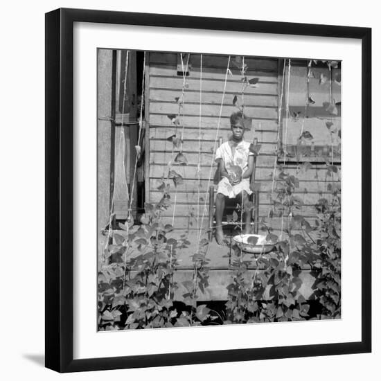 Child in person quarter Memphis, Tennessee, 1938-Dorothea Lange-Framed Photographic Print