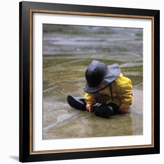 Child in the Rain-Nicole Katano-Framed Photo