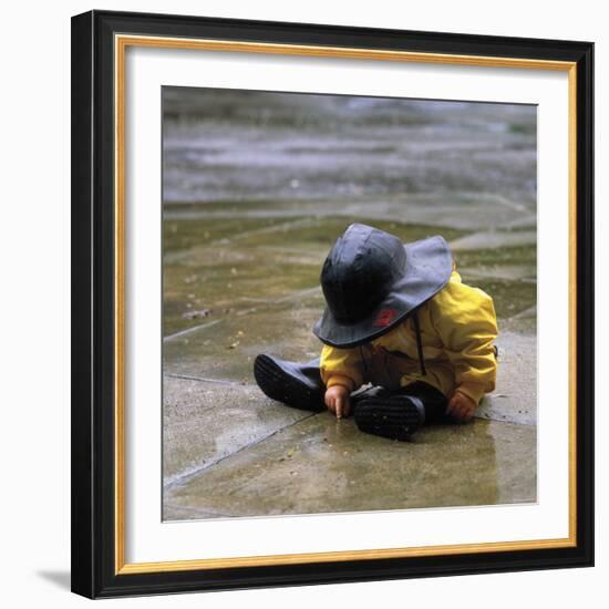 Child in the Rain-Nicole Katano-Framed Photo