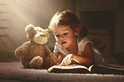 teddy bear and little girl