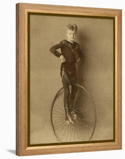 Child on a Unicycle, Late 19th Century-G. & R. Lavis-Framed Premier Image Canvas