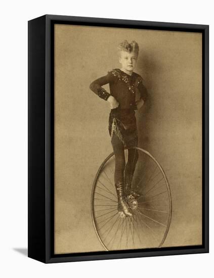 Child on a Unicycle, Late 19th Century-G. & R. Lavis-Framed Premier Image Canvas