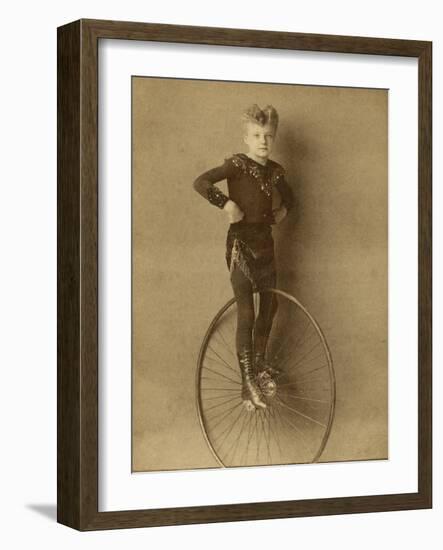 Child on a Unicycle, Late 19th Century-G. & R. Lavis-Framed Photographic Print