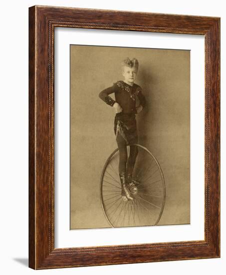 Child on a Unicycle, Late 19th Century-G. & R. Lavis-Framed Photographic Print