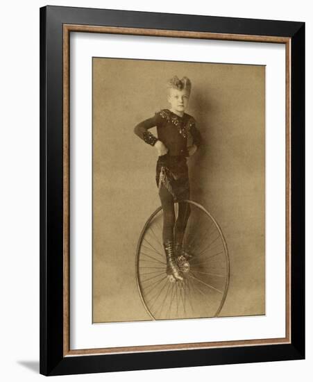 Child on a Unicycle, Late 19th Century-G. & R. Lavis-Framed Photographic Print